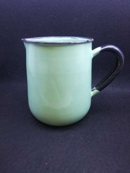 Vintage green enamel jug