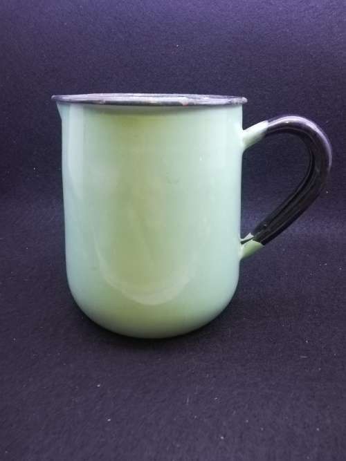 Vintage green enamel jug