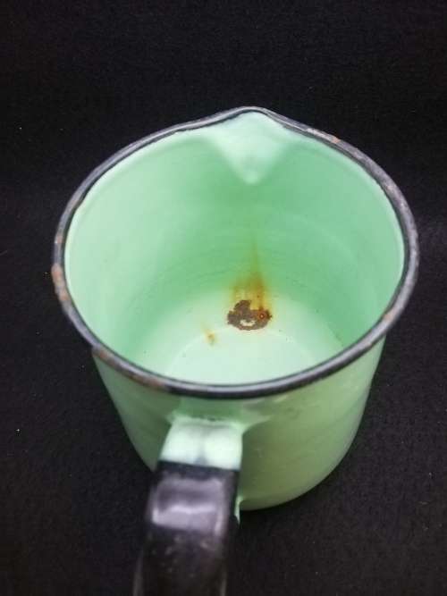 Vintage green enamel jug