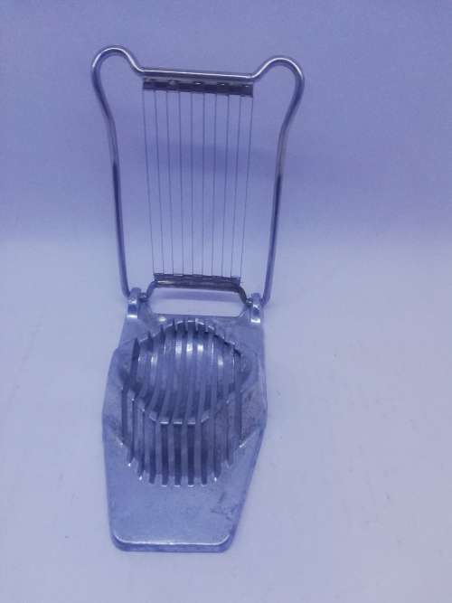 Vintage aluminum egg slicer