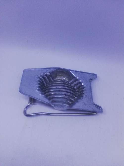 Vintage aluminum egg slicer