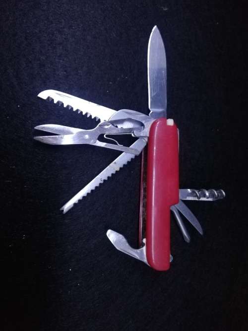 Swiss gear multi tool with leather pouch - one toothpick missing