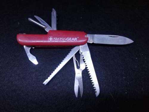 Swiss gear multi tool with leather pouch - one toothpick missing