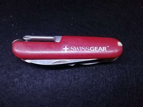 Swiss gear multi tool with leather pouch - one toothpick missing
