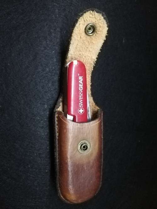 Swiss gear multi tool with leather pouch - one toothpick missing