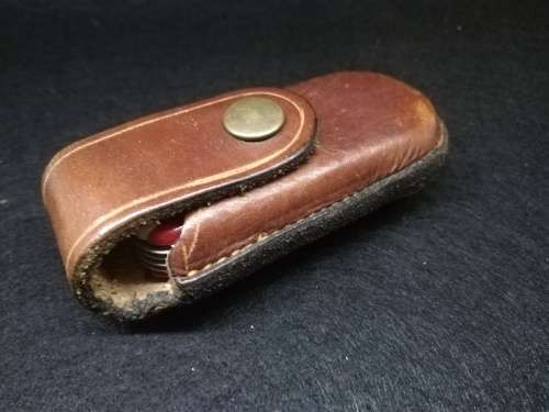Swiss gear multi tool with leather pouch - one toothpick missing