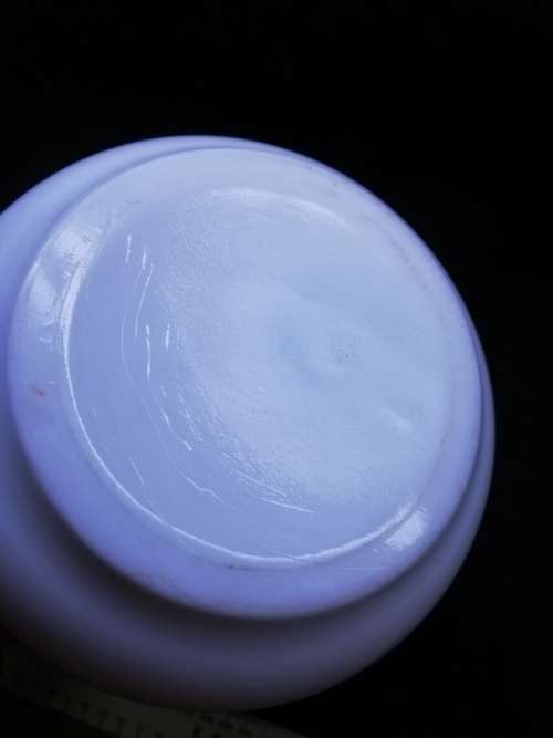 Blue on milk glass vase