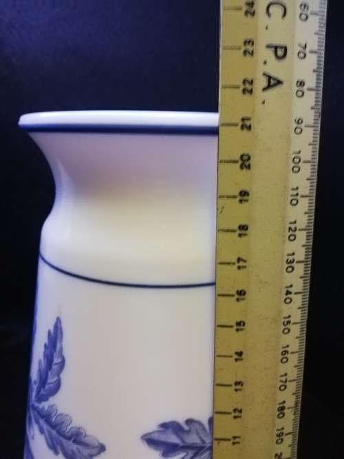 Blue on milk glass vase