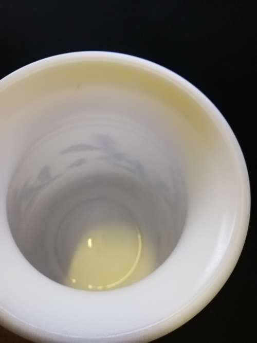 Blue on milk glass vase