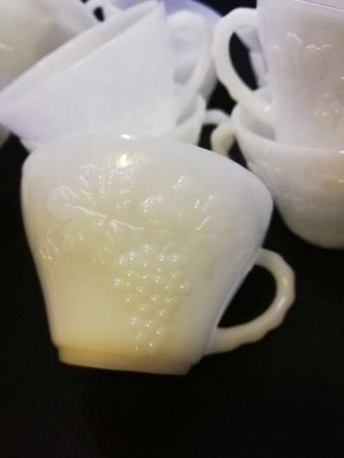 Milk glass punch bowl with 11 cups!