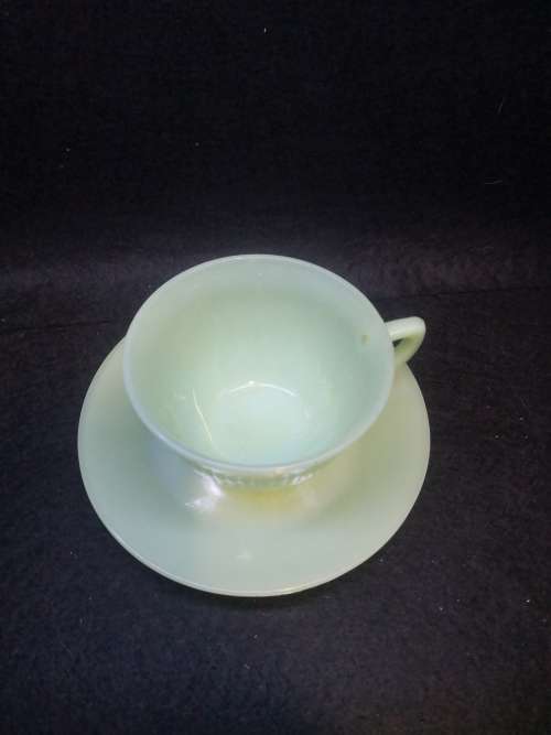 Green milk glass cup and saucer  unmarked Jadeite?