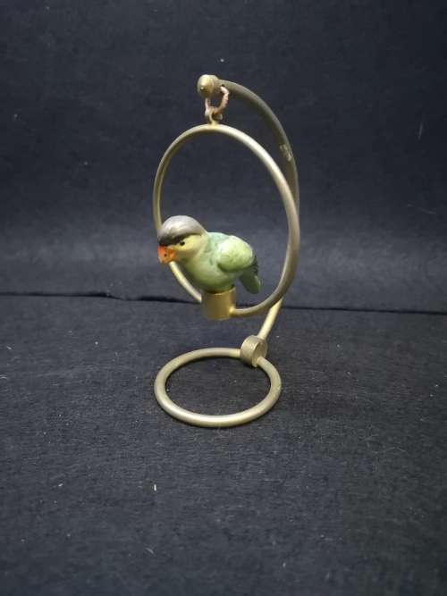 Parrot in a ring ornament