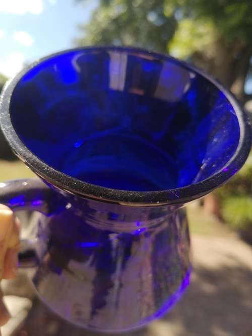 Blue glass jug - has a crack but still lovely