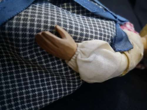 Wooden folk art doll