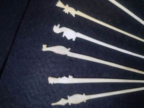 Looks like handmade cocktail/toothpicks