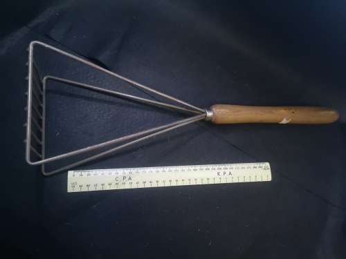 Massive kitchen tool - masher?Pap ?