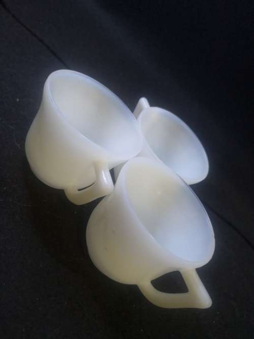 Small milk glass cups
