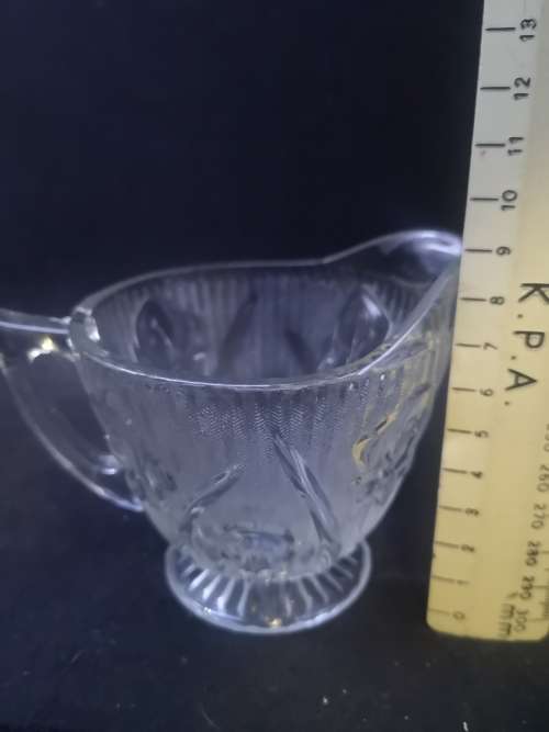 Pressed glass milk jug