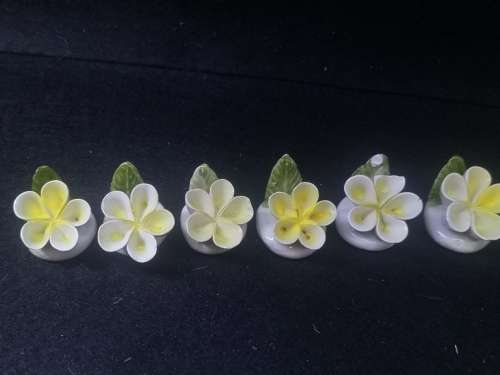 Vintage place setting flowers - note one has damage