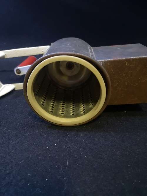 Very well used old grater - with table clamp