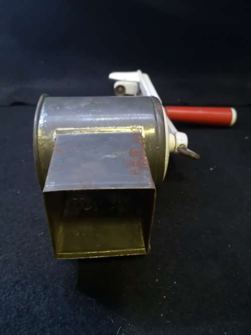 Very well used old grater - with table clamp