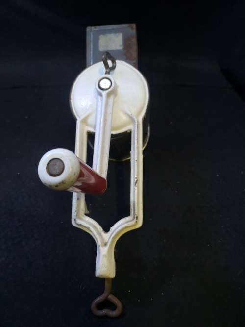 Very well used old grater - with table clamp