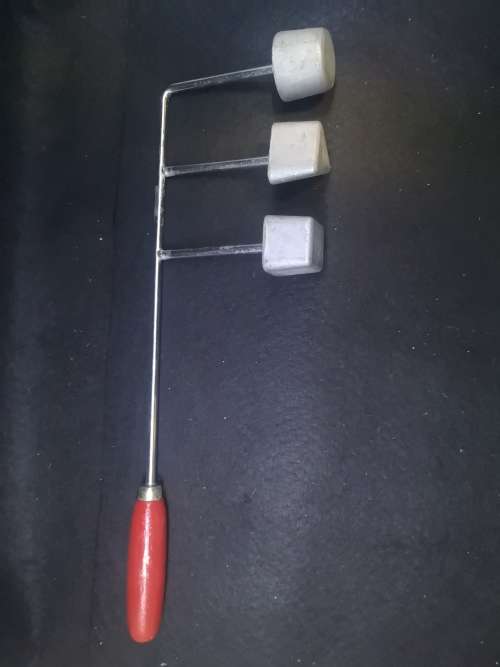 Snackle with red handle