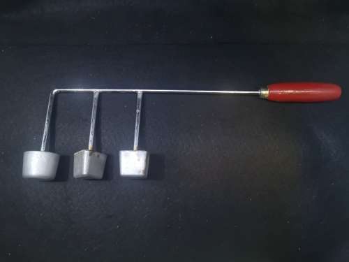 Snackle with red handle