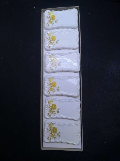Yellow porcelain name placements
