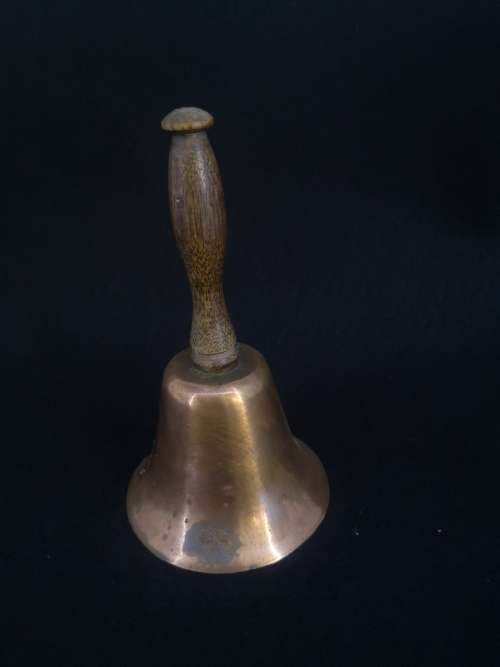 Copper bell with wooden handle