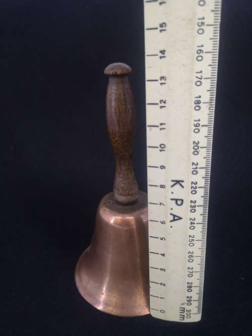 Copper bell with wooden handle