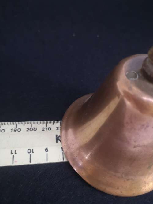 Copper bell with wooden handle