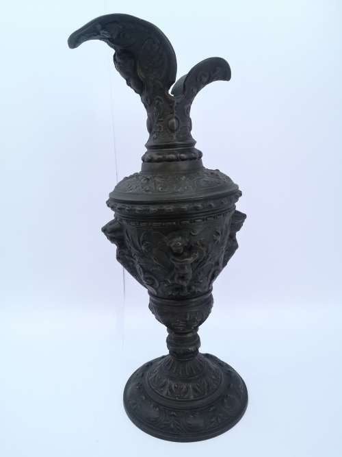 Antique style ewer with embossed Cherubs