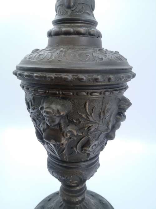 Antique style ewer with embossed Cherubs
