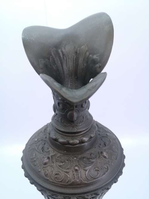 Antique style ewer with embossed Cherubs