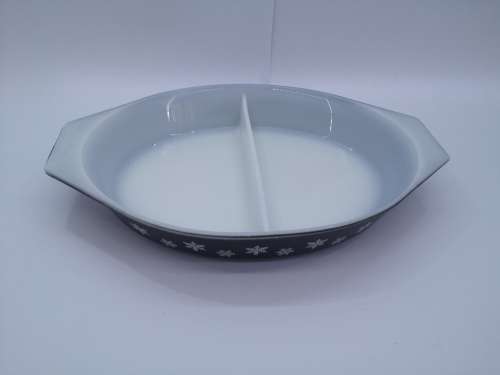 Snowflake on black divider dish