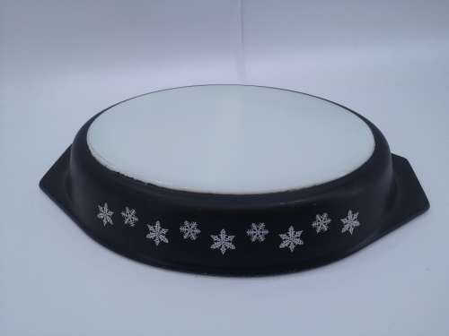 Snowflake on black divider dish