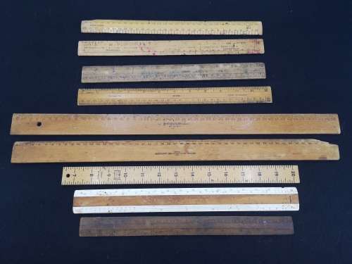 collection of wooden rulers