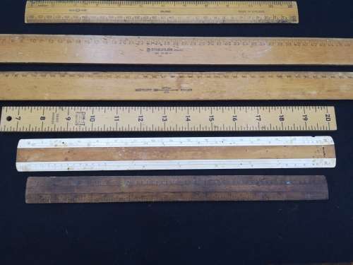 collection of wooden rulers