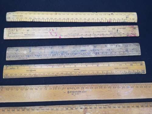 collection of wooden rulers