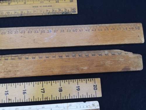 collection of wooden rulers
