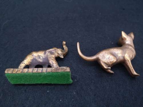Mini bronze elephant and a cat