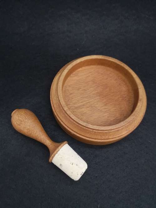 Wooden wine coaster and stopper Designed and turned by Roger Mulroy