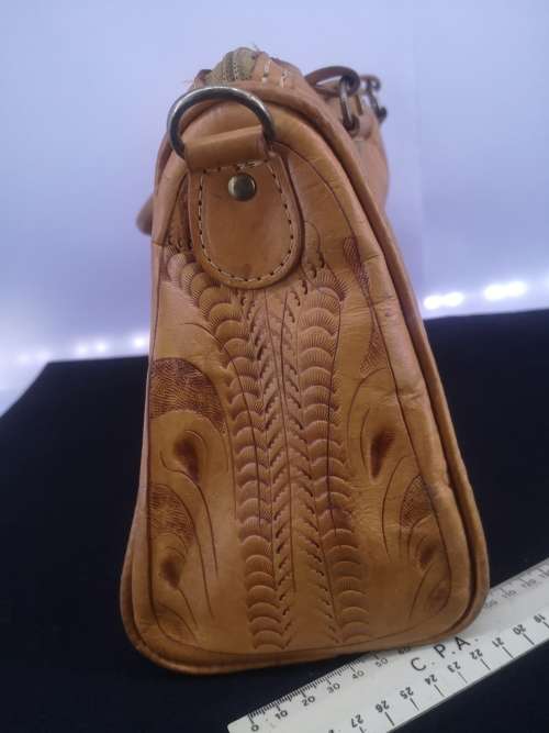 Hand crafted leather handbag with shoulder strap