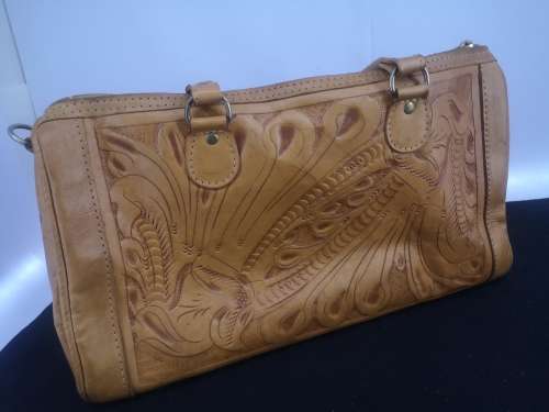 Hand crafted leather handbag with shoulder strap