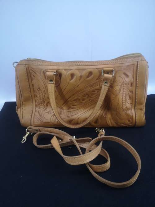 Hand crafted leather handbag with shoulder strap
