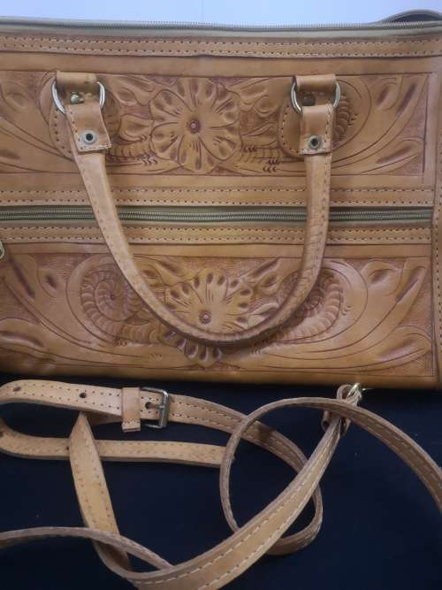 Hand crafted leather handbag with shoulder strap