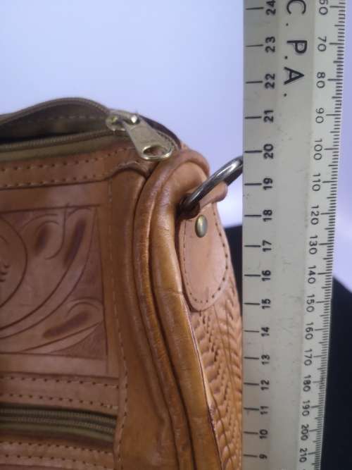 Hand crafted leather handbag with shoulder strap