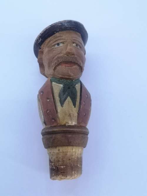 Hand carved wooden wine stopper