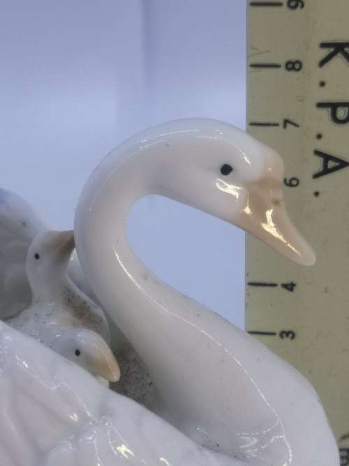 Heritage Porcelain Swan Figurine: Swan Song